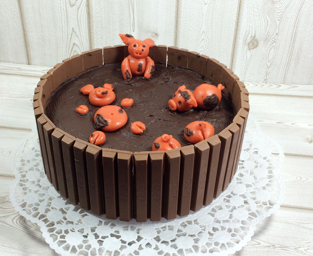 Schweinchen im Matschkübel Torte - ♥ Herzbotschaft.de